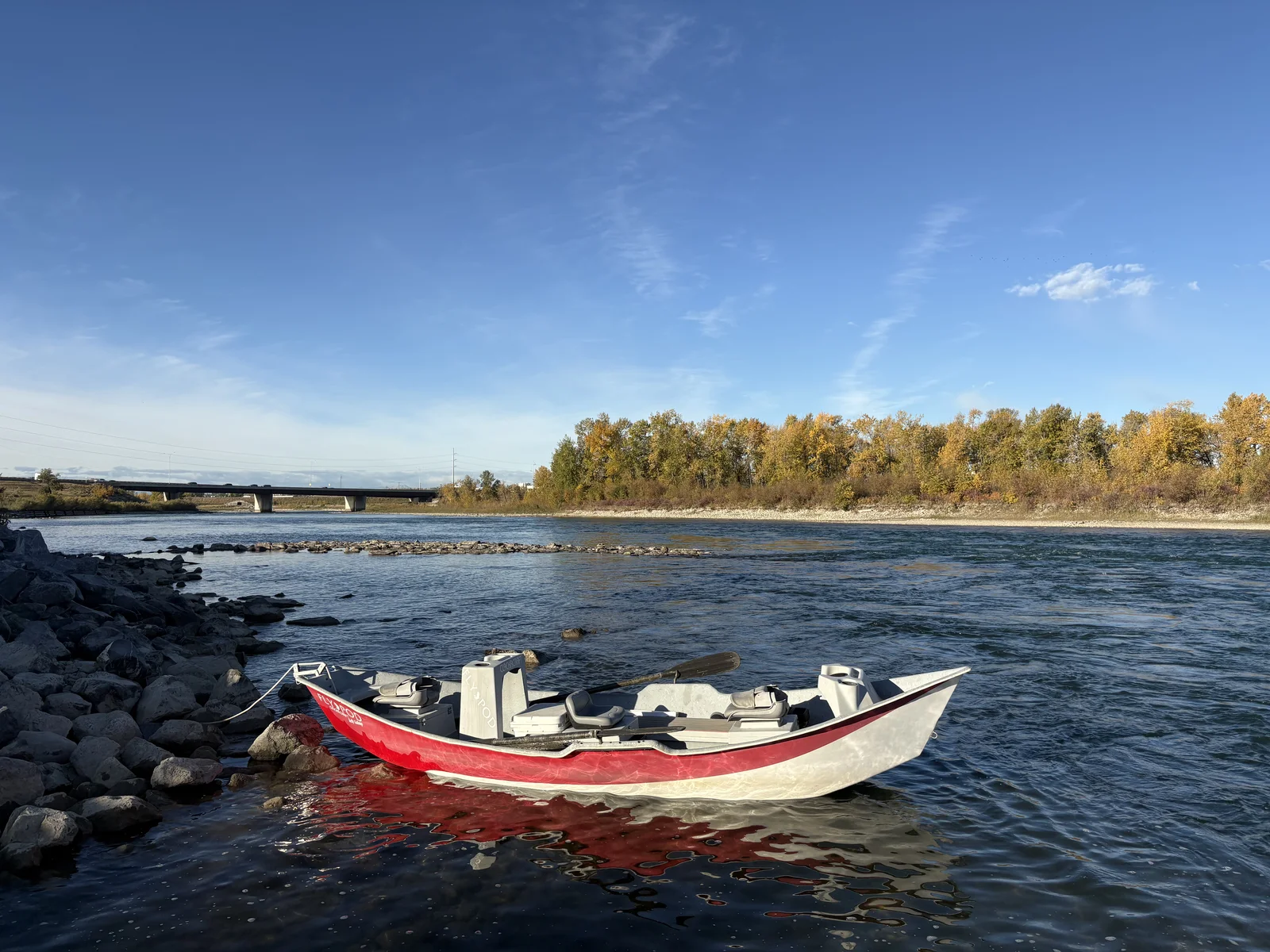 King Trout Outfitters drift boat on the Bow River - Calgary fly fishing guides