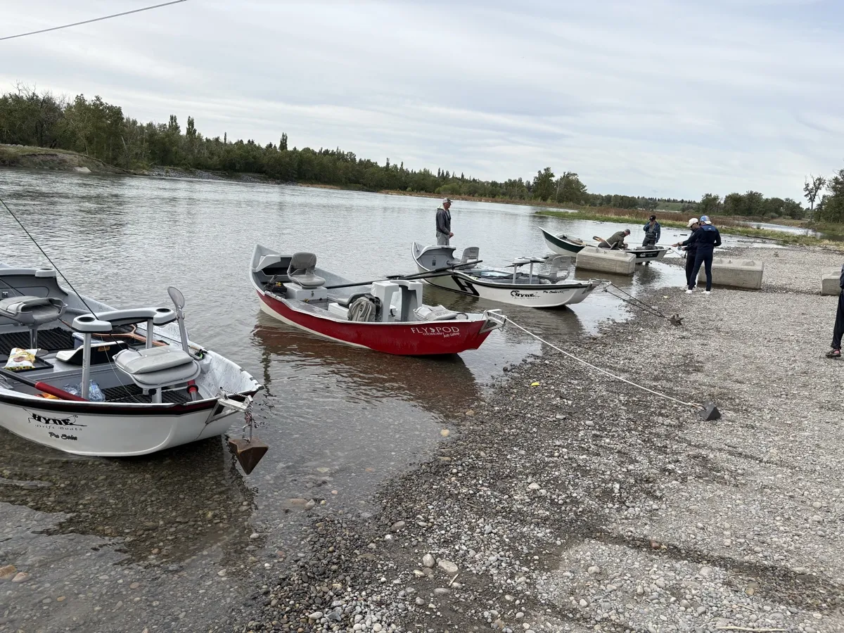 FlyPod drift boats at a Bow River launch point near Calgary